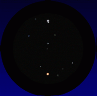 A simulated telescope view of Mars passing the double-star Graffias (Beta-1 Scorpii) on March 16th 2016. South is up and East to the right; the field of view is about 13 arcminutes. Click for full-size animation, 67 KB (Copyright Martin J Powell, 2015)