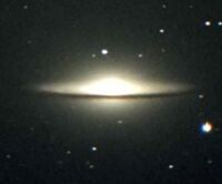 The Sombrero Galaxy (M104). Click for larger version, 6 KB (Photo from 'Learn What's Up')